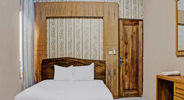 Семейный люкс Capital O 92681 Randu Mas Hotel & Resort Taman Purbakala