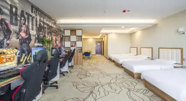 Кровать в общем номере Korla Star Dexiang Hotel