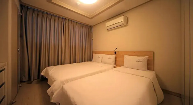 Номер Deluxe Staywell Hotel