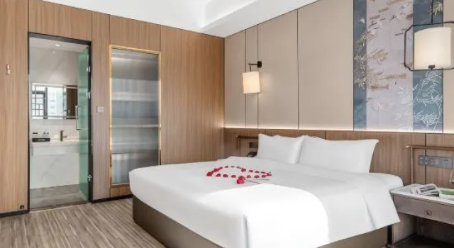 Люкс Laixiang Zhenpin Resort Hotel（Gaozhuang Xishuangjing Xingguang Ninht Mardet)