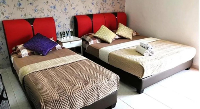 OYO Home 90389 Haji Hassan Guesthouse, Boek Hotel Pantai Cenang 