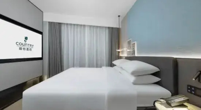 Люкс Deluxe Country Inn & Suites by Radisson Hotel （Anshun Ancient City Gufu Street Store）