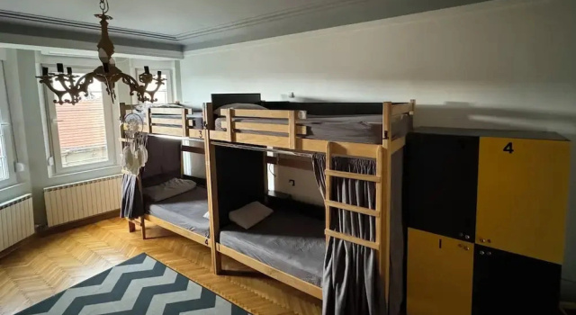 Кровать в общем номере Nomad Hostel