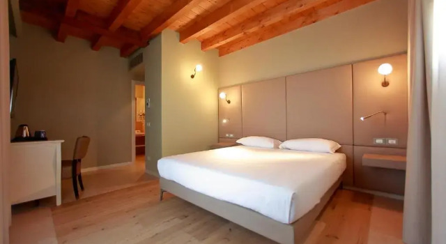 Номер Deluxe Le Greghe Suites