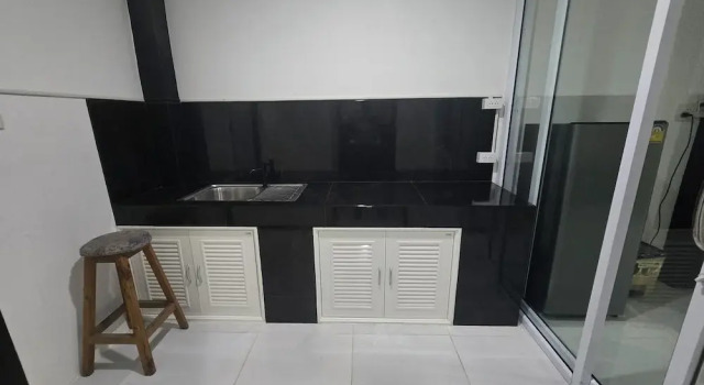 Кровать в общем номере Sasitara Residence