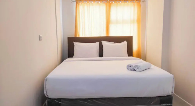 Апартаменты Standard Luxurious 1BR at Vida View Makassar Apartment By Travelio