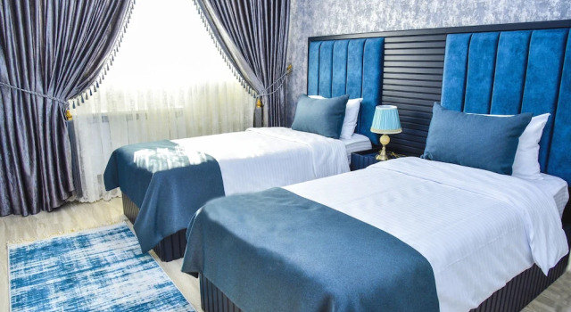 Четырёхместный люкс Business с балконом Supreme Hotel Baku