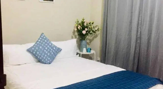 Двухместный номер Deluxe с балконом Yi Jia Homestay