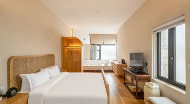 Люкс Qiheng Shishe Hotel