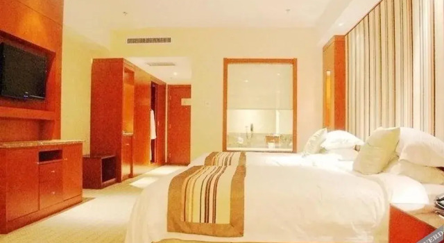 Iris Orchard All Suites Hotel (Tangshan Convention Center), Book Hotel 4-stjernede hoteller i Tangshan, 4*