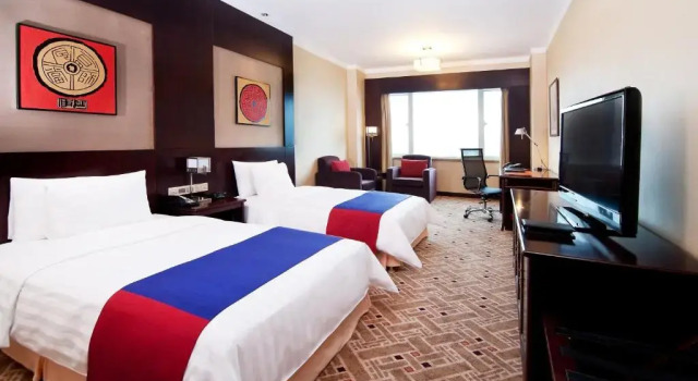 Четырёхместный номер Deluxe Crowne Plaza Shanghai Pudong by IHG