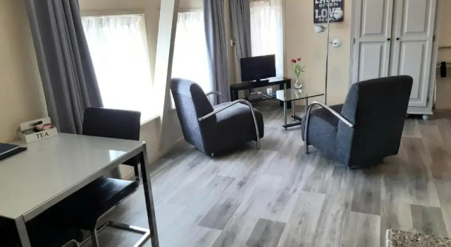 Номер Standard Logement De witte klok