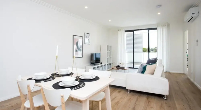 Designer Executive Apartment + Parking near Train