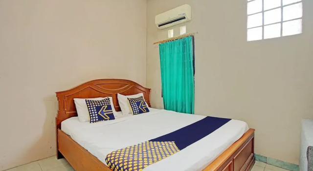 Confort chambre SPOT ON 92905 Sutomo Residence Syariah Near Taman Tugu Padang Area