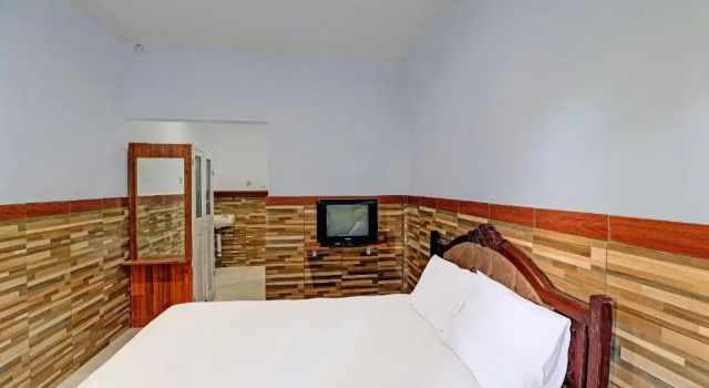 Номер Deluxe OYO 91678 Citarum Guest House