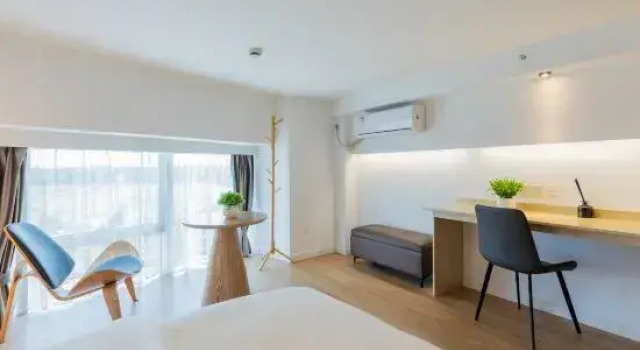 Люкс Дуплекс с 4 комнатами Huazhishe Apartment (Hongqiao National Convention and Exhibition Center Branch)