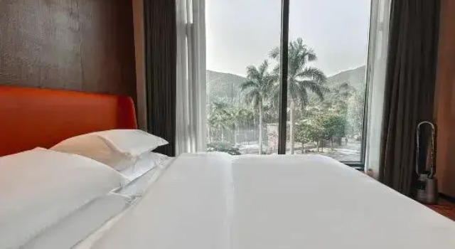 Кровать в общем номере с 6 комнатами с видом на озеро YueRong Mountain House Manor, Guangzhou