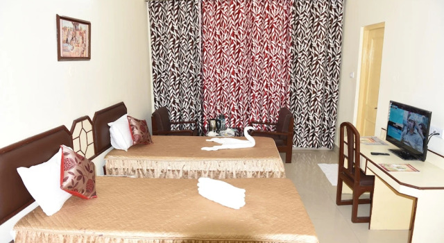 Четырёхместный номер Deluxe с видом на сад Hotel Lumbini International