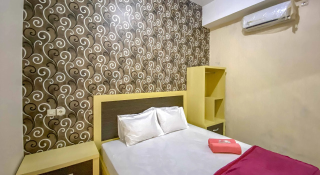 Tini's Guest House Malang RedPartner, Rezervați Pensiune Pensiuni în Malang, aproape de Mall Olympic Garden, Pensiune
