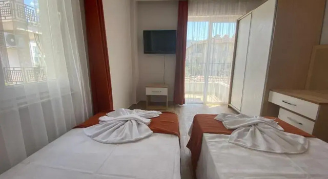Четырёхместный номер Standard с видом на море Kent Otel