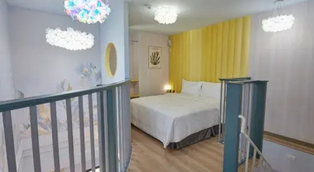 Четырёхместный номер Deluxe с балконом 星澄風旅 Zela Design Hotel
