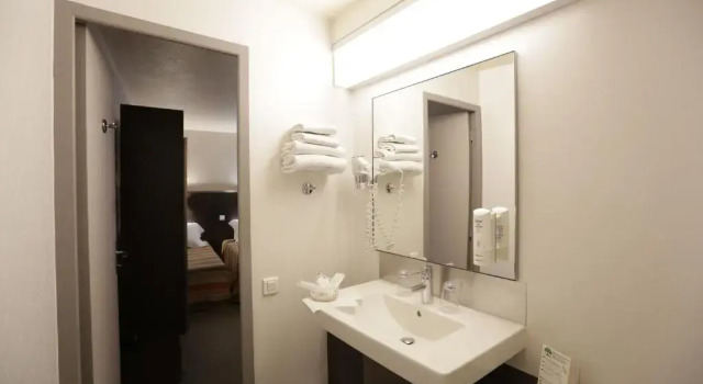 Четырёхместный номер Standard Hôtel Au Petit Caporal