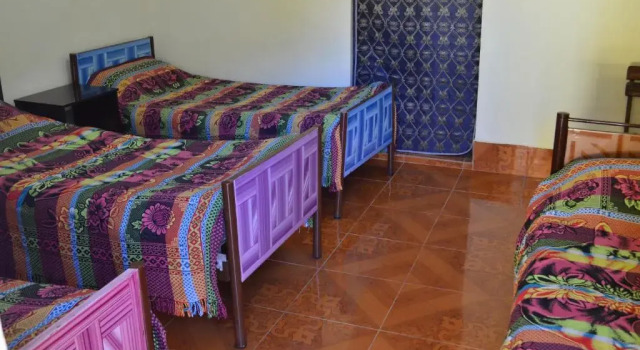 Кровать в общем номере Hostal Wilma