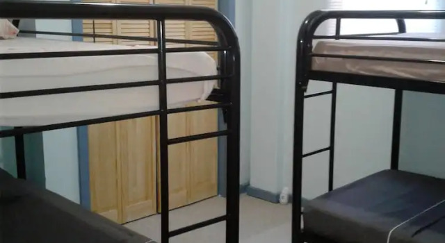 Кровать в общем номере Apartments 145