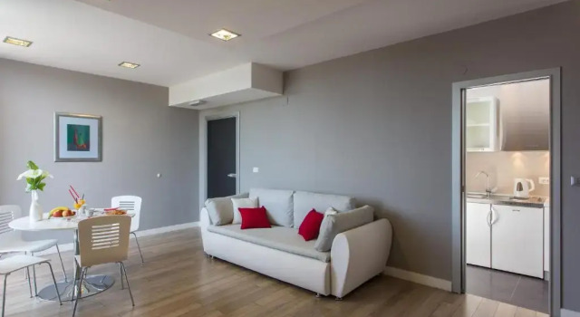 Студия Deluxe с балконом и с видом на город Apartments ZoomZoom