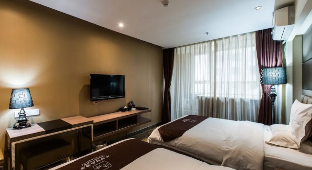 Weihai Huakun Hotel, Забронировать Отель Отели Хуанькуй 3 звезды, 3*