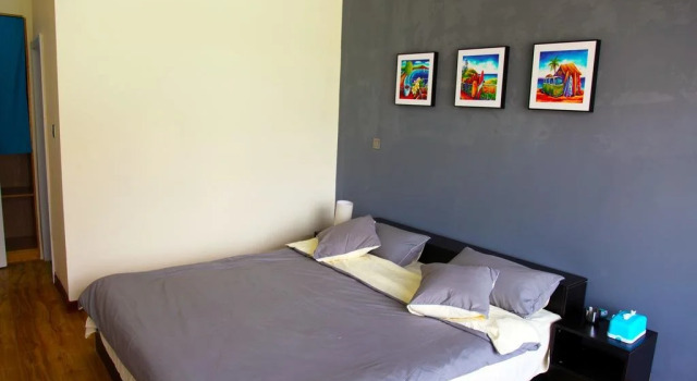 Ri Yue Bay Surfers Stop Hostel, Boek Hostel Wanning Hainan