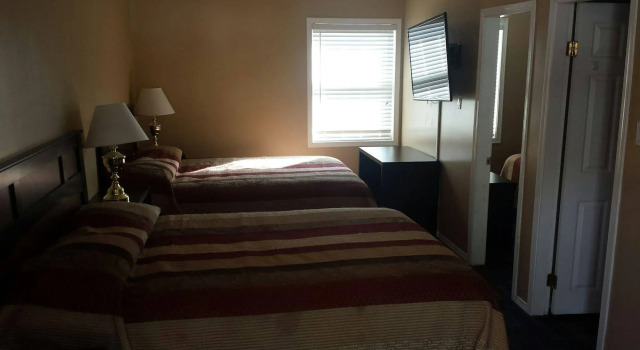 Rainbow INN, Buchen Sie Motel  
