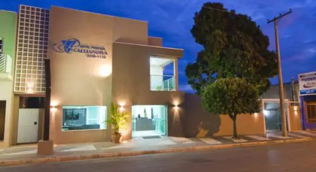 Кровать в общем номере Hotel Pousada Calliandra