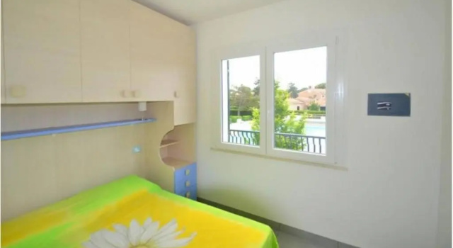 Terraced house with private garden, Забронировать Дом для отпуска Бибионе-Пинеда Венето, рядом с Долина Вальгранде