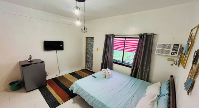 Четырёхместный номер Standard с балконом Lazy Daze Hometel Boracay