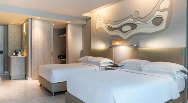 Четырёхместный номер Standard с балконом и с видом на океан Hilton Santa Marta