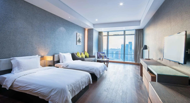 Двухместный номер Deluxe Grand Madison Qingdao Harbour-view Central（Former Qingdao Farglory Hotel）