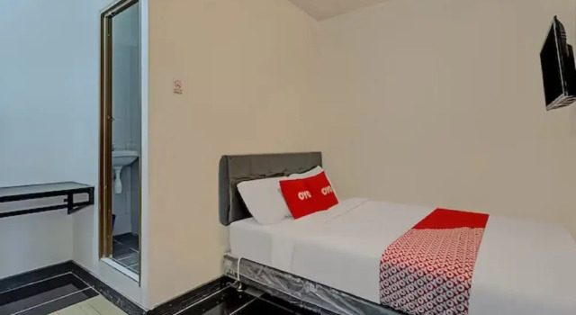 Capital O 3198 Sukomanunggal Inn