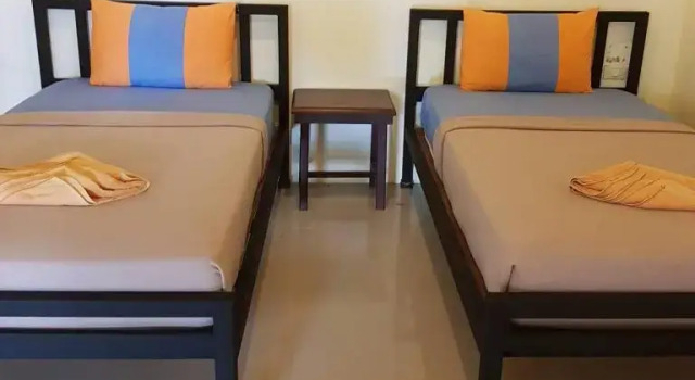 Кровать в общем номере Lanta Just Come Hotel
