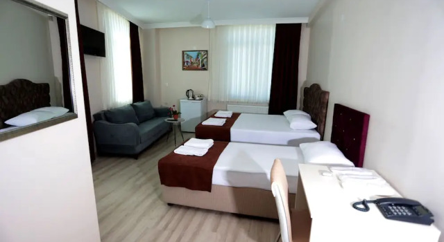 Трёхместный семейный номер BEKSİTİ HOTEL