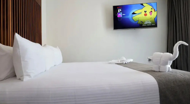 Трёхместный номер Deluxe с 3 комнатами с видом на бассейн Solmare Apartments & Suites