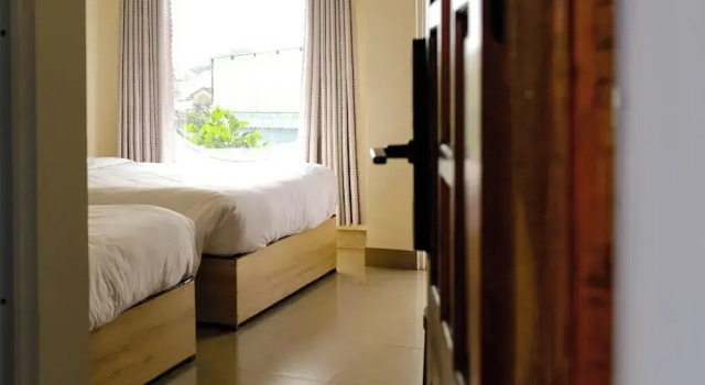 Четырёхместный семейный номер Standard с балконом и с видом на сад Paradise Hotel Hoi An