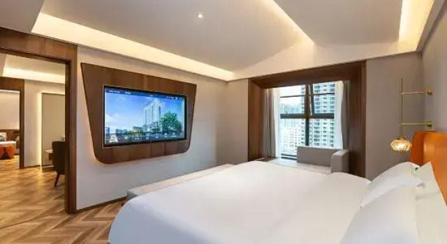 Трёхместный люкс Guanghan Minshan Jingyun Hotel