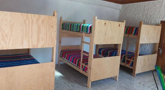 Кровать в общем номере El Sunset Hostel