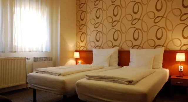 Трёхместный номер Standard König Hotel