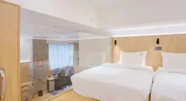 Кровать в общем номере Suyue Realm-City travel Smart E-sports Hotel