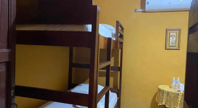 Кровать в общем номере Hotel San Miguel