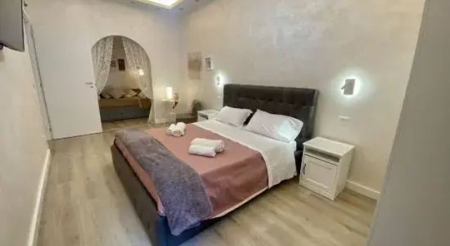 Апартаменты Apartment Near the Colosseum, With Metro Line A a 2 Minutes Walk Away