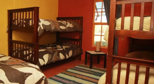 Кровать в общем номере Hostal Casa Campestre