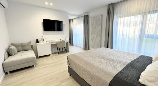 Номер Deluxe AVA Urban Suites